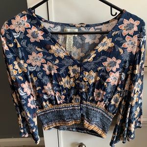 Never worn. Medium button-up crop top.